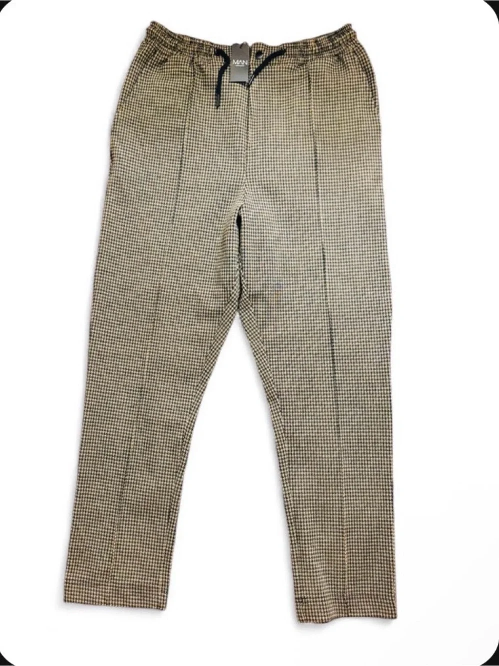 Black & white checkered pants with a stylish plaid pattern